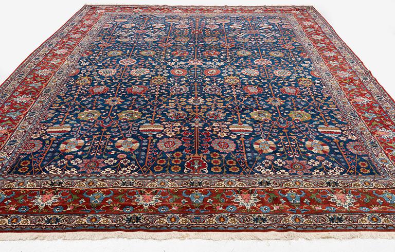 A semi-antique Qum carpet of Safavid design, Central Persia (Iran), c. 416 x 315 cm.