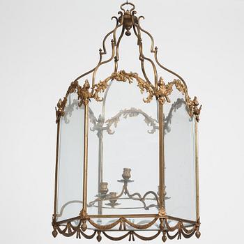 A Swedish rococo gilt-brass four-light lantern, possibly a masterpiece, Stockholm, later part of the 18th century.