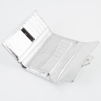 Chanel, a quilted silver leather wallet, 2006-08.