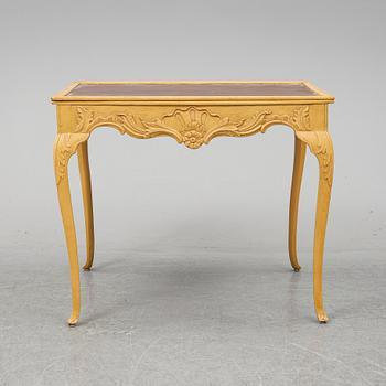 A presumably rococo style 19th century table.