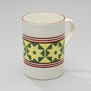 A MUG. Fennia series. The designers Jac. Ahrenberg och Thure Öberg.