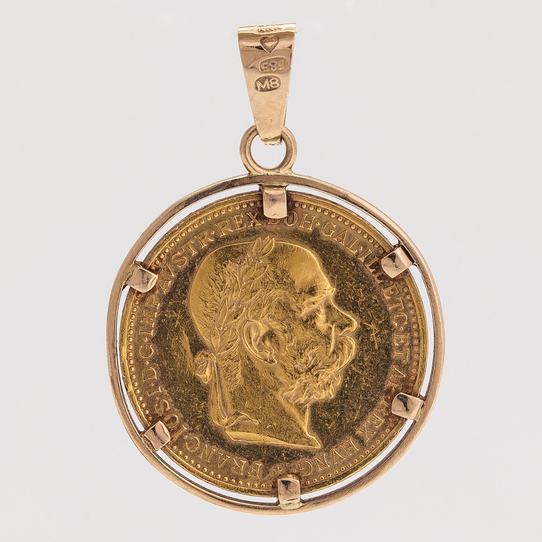 A ca 21K (.900) and 14K gold coin pendant, Franz Joseph I, Austria-Hungary, 1895. 20 Corona.