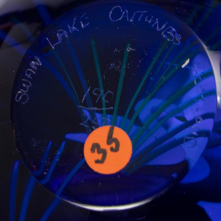 Baccarat, Caithness of Scotland, Murano, Lundberg Studios, five glass paper weights, signed.