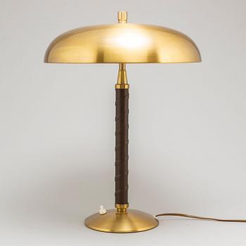 EINAR BÄCKSTRÖM, a brass modell 5013 table lamp.