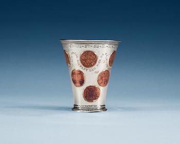 841. A SWEDISH SILVER AND COPPER BEAKER, un marked, early half of 18th century.