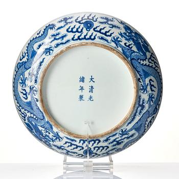 A large blue and white 'five clawed dragon' dish, Qing dynasty, Guangxu mark and period (1875-1908).