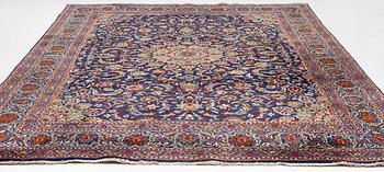 An oriental carpet, c. 390 x 295 cm.