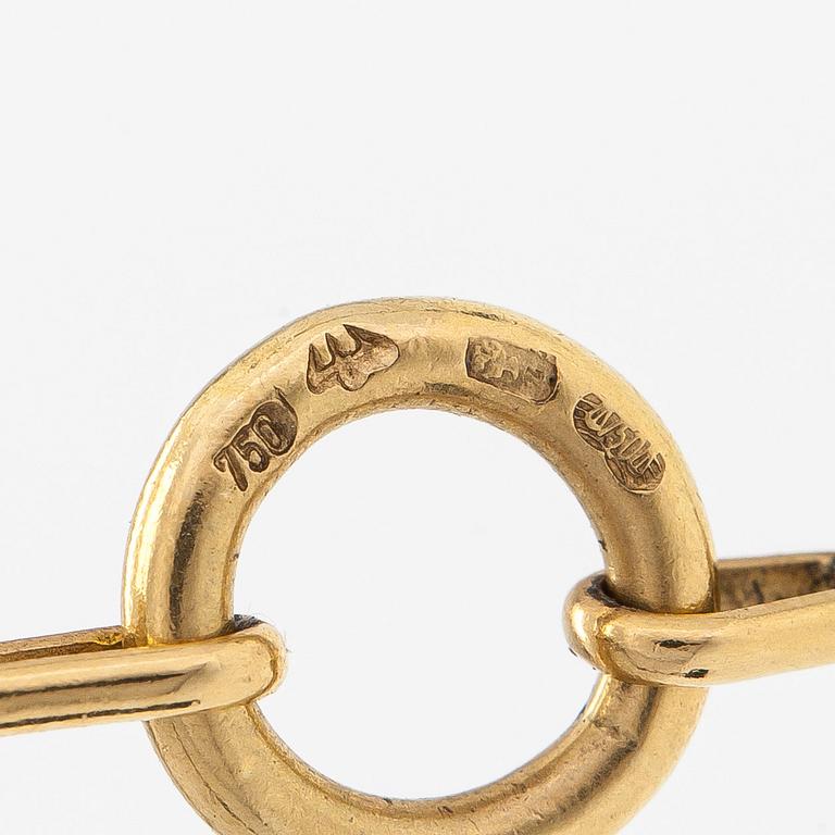 An 18K gold necklace, with diamonds totalling approx. 0.12 ct. Foreign hallmarks.