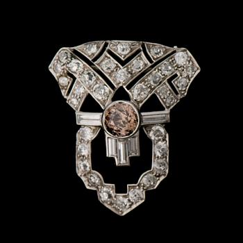 A BROOCH, old and baguette cut diamonds, platinum.