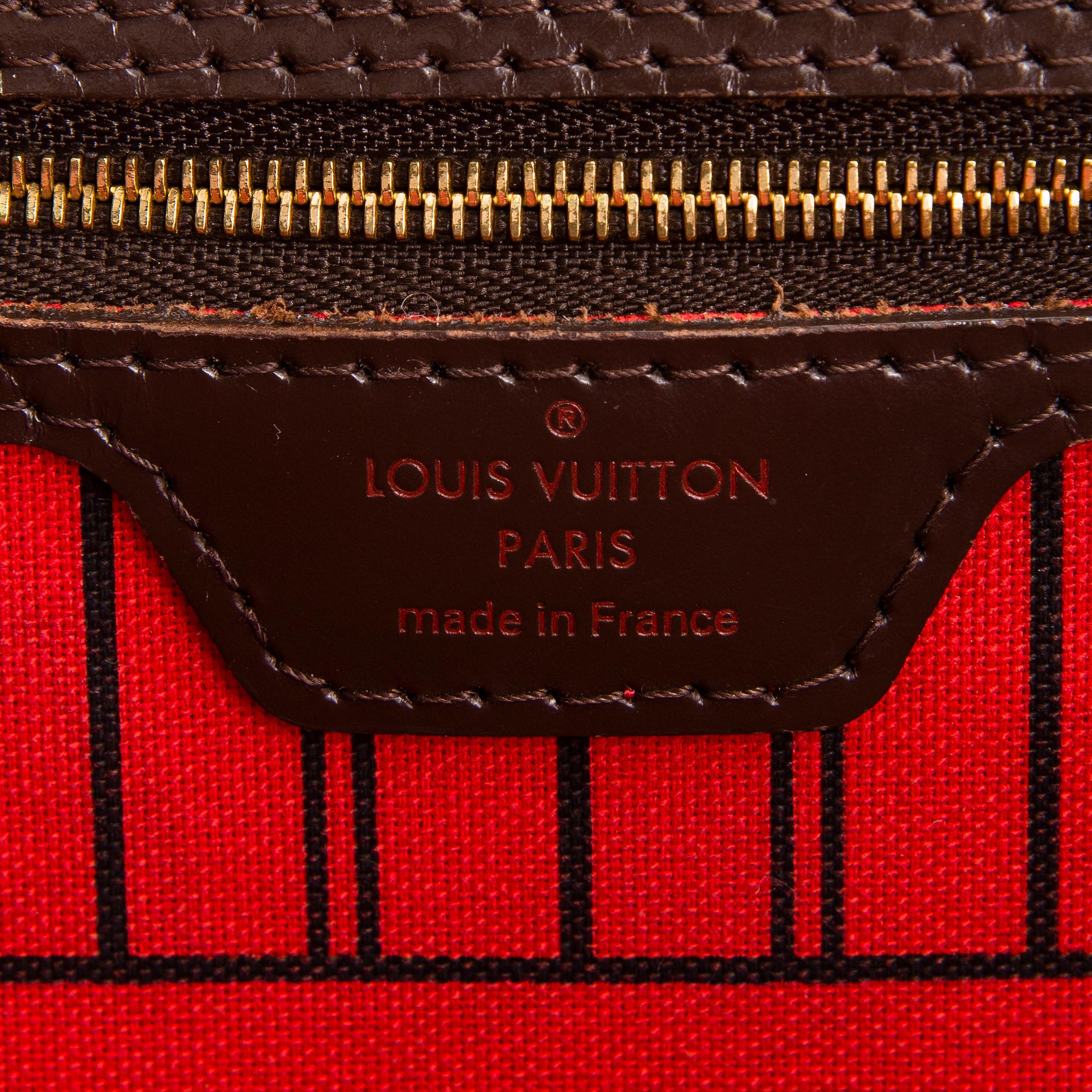 Louis Vuitton, a 'Neverfull MM' Damier Ebene Bag.