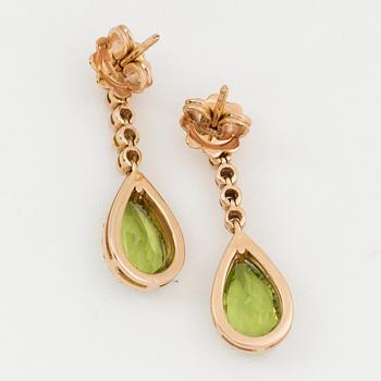 Peridot and brilliant-cut diamond earrings.