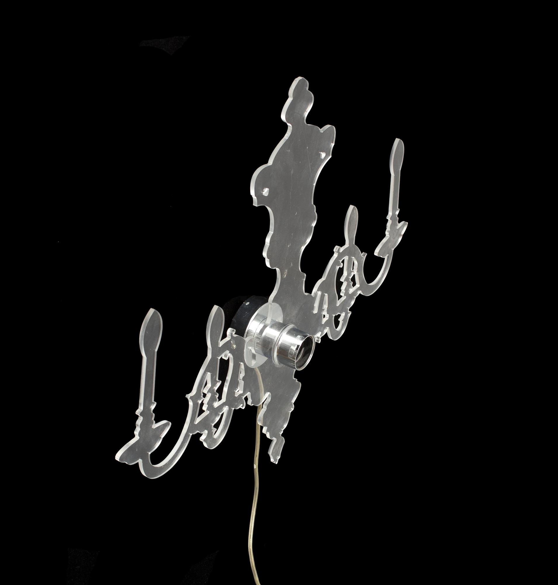 A Ligne Roset 'Louis 5D' wall light by Blandine Dubos.