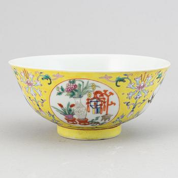 A famille rose  yellow ground bowl, China, 20th Century.