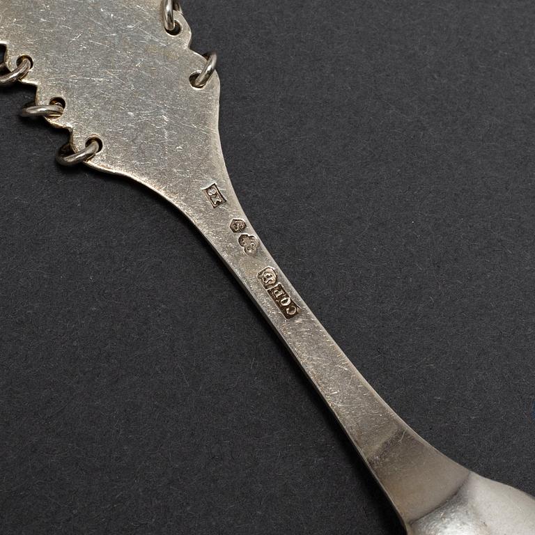 A SILVER CAKE KNIFE AND 12 COFFEE SPOONS, samian, second half of the 20th century.