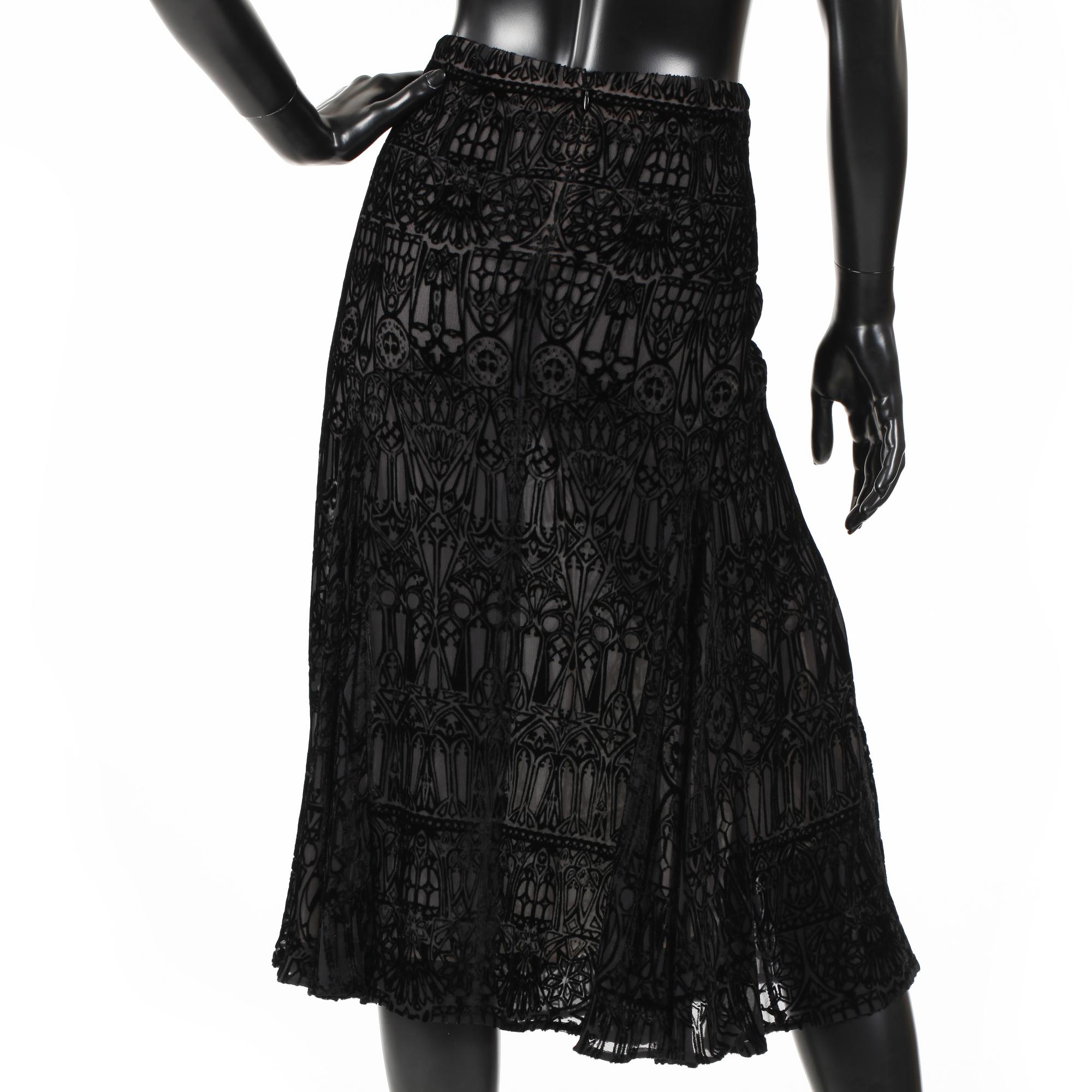 ALEXANDER MCQUEEN, a black skirt.