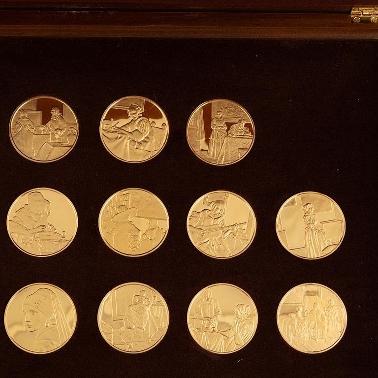 Silver Gilt Coins with motifs after Jan Vermeer, Franklin Mint (31 pieces).