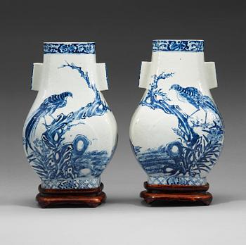 366. A pair of blue and white vases, Qing dynasty, 19th Century.