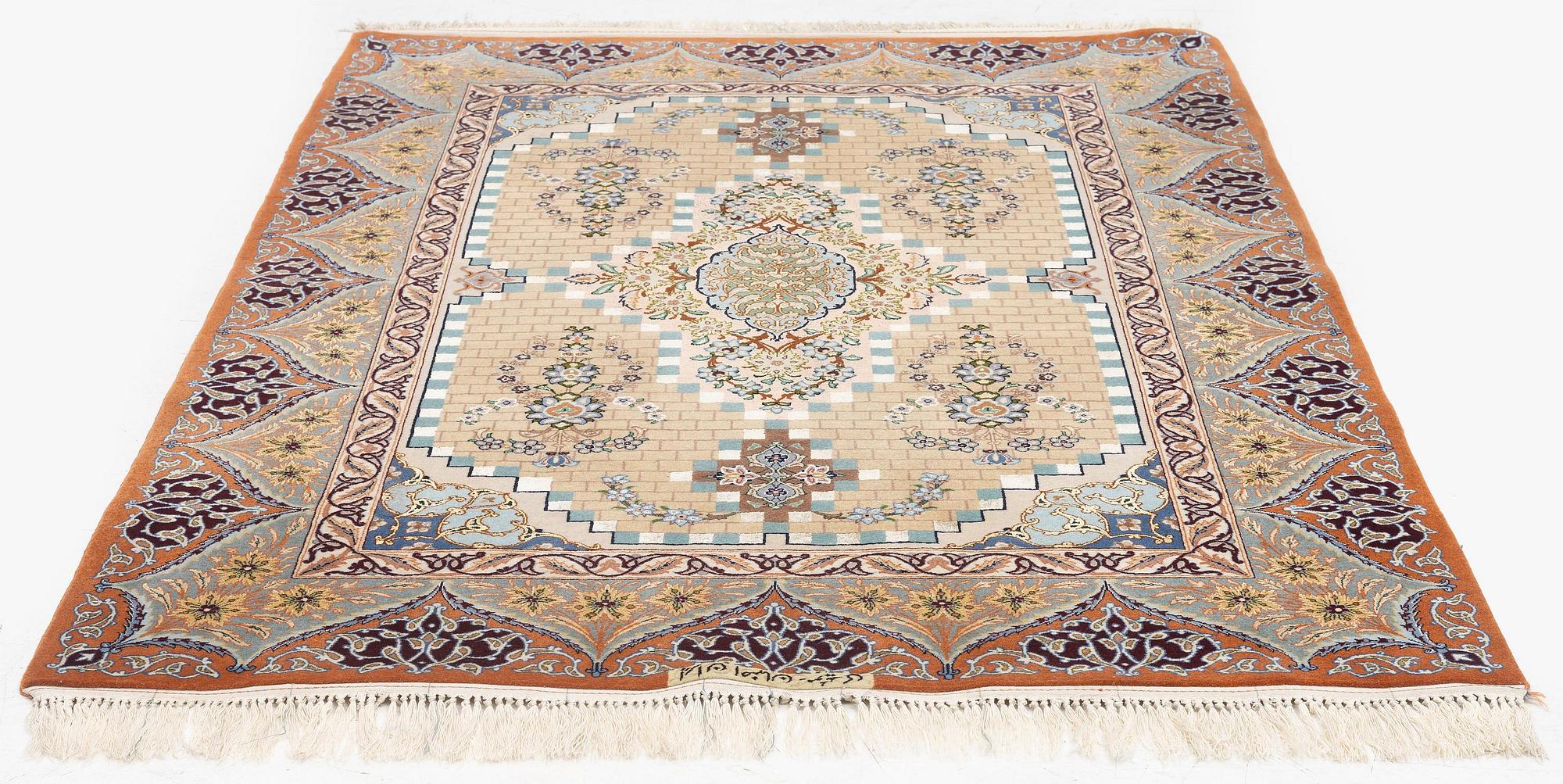 A part silk Isfahan rug, Central Persia (Iran), signed 163 x 108 cm.