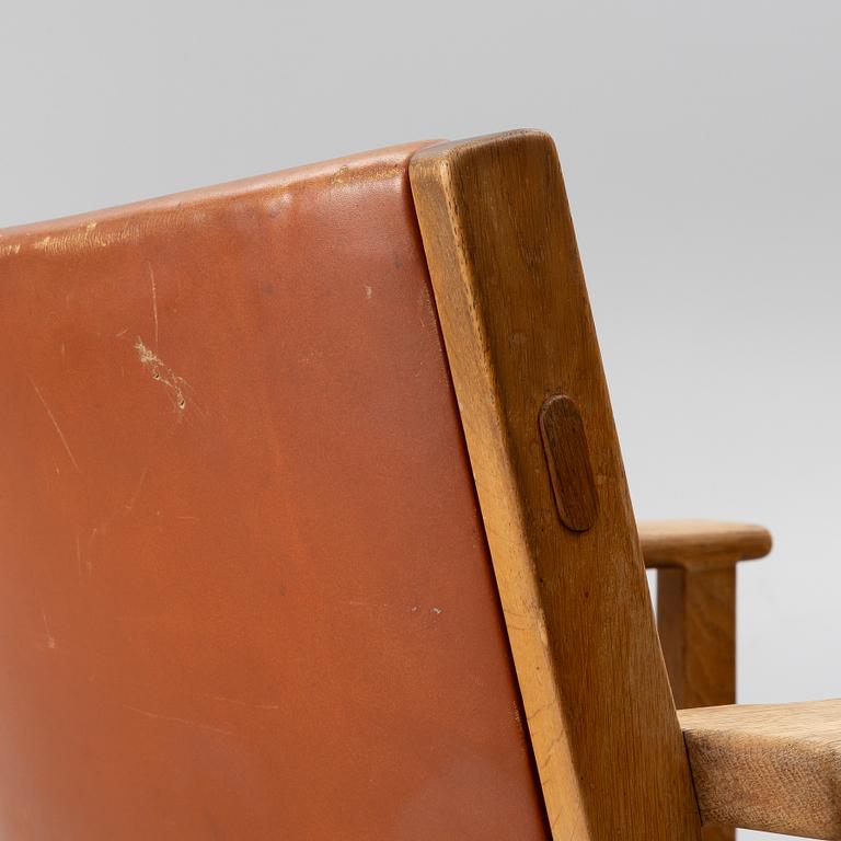 Hans J. Wegner, an armchair for A.P. Stolen, Copenhagen, Denmark, mid 20th century.