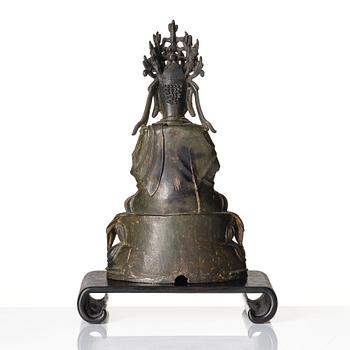 A bronze scultpure of Guanyin, Ming dynasty (1368-1644).