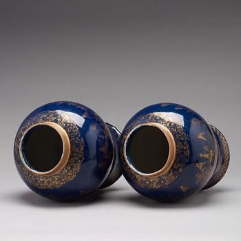 A pair of 'powder blue' baluster jar with covers, Qing dynasty, Qianlong (1736-95).