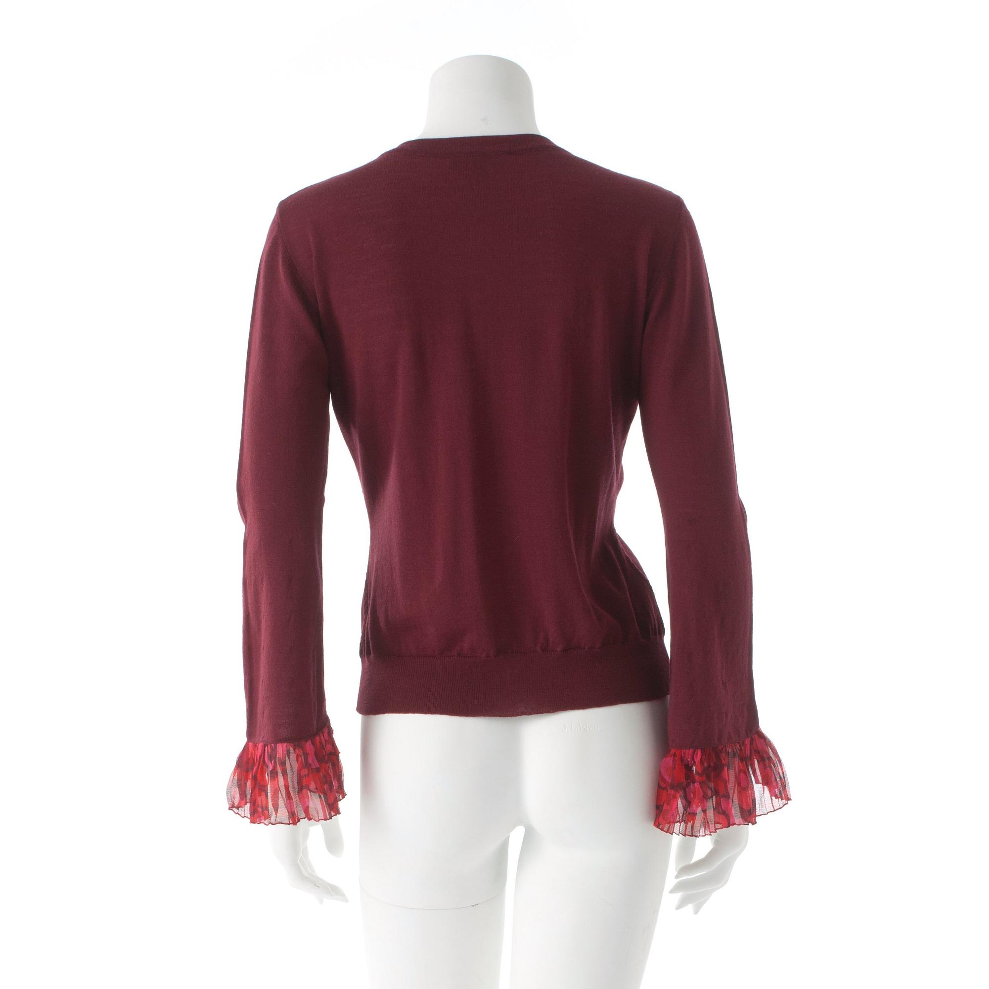 BURBERRY, a burgundy red merino wool cardigan.