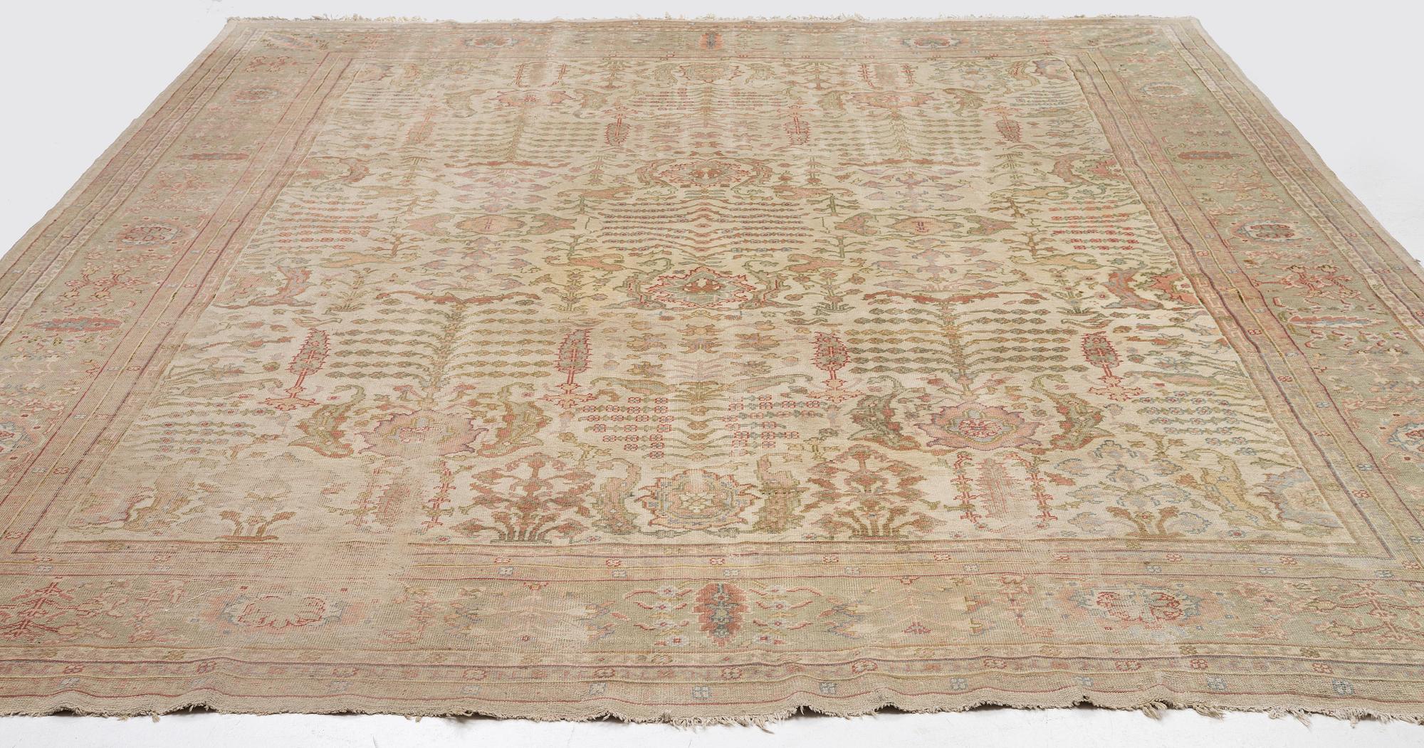 An antique Ushak carpet, West Anatolia, c. 486 x 391 cm.