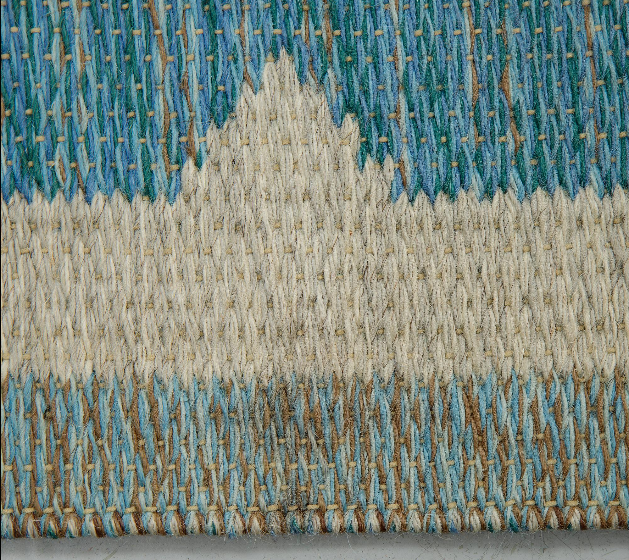 Matto, a machine-made double weave, ca 224 x 165 cm, signed JS.