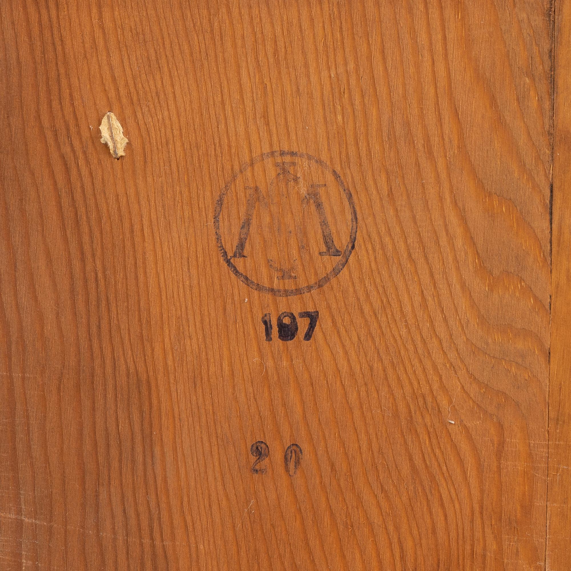 An elmwood-veneered bookcase, Nilsson & Johansson Möbelfabrik, Björnum, mid 20th century.