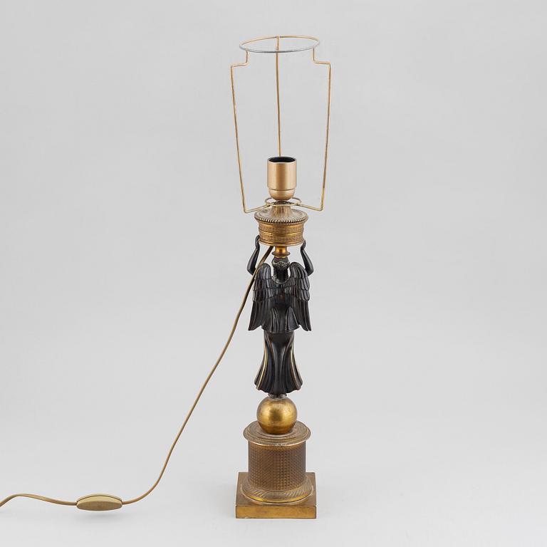 A bronze empire style lamp, second half of the 19th century.