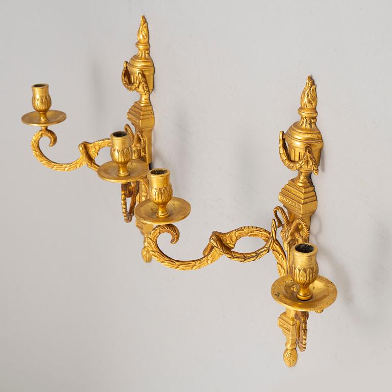 A pair of wall sconces, Louis XVI style, early 20th century.
