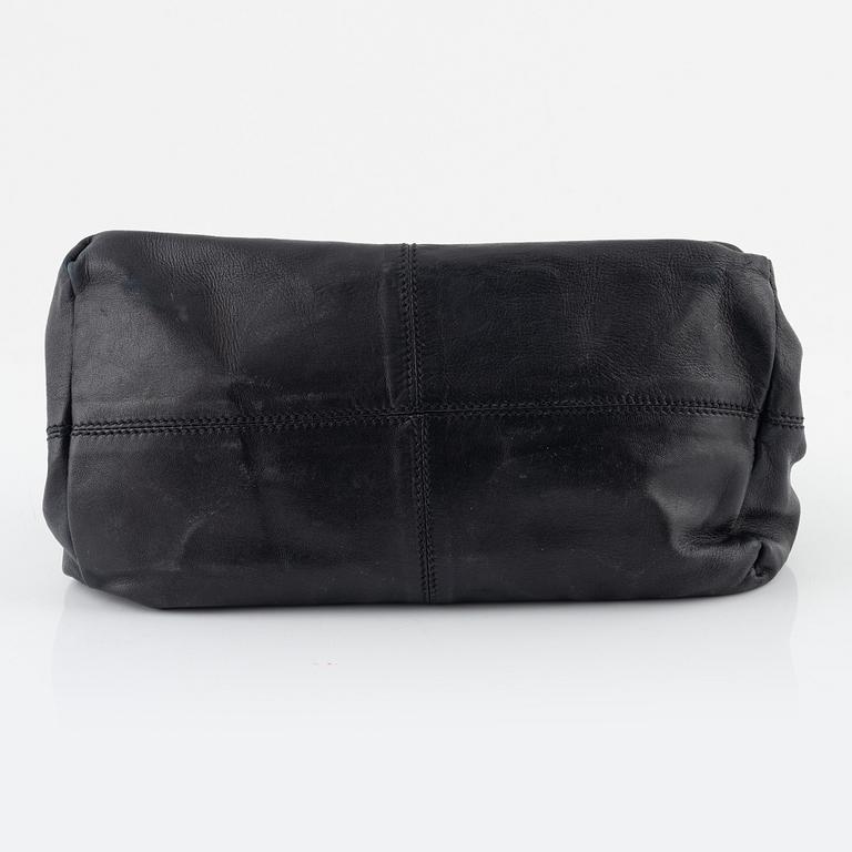 Prada, A black leather bag.