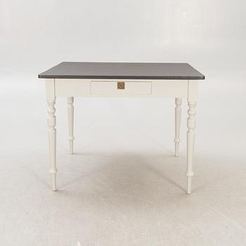 A painted working table later part of the 19th century.