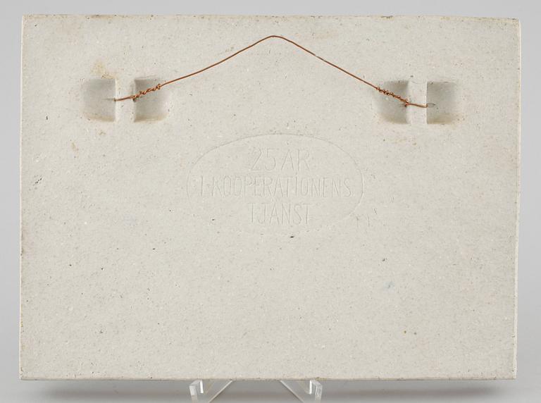 A stoneware wall plaque by Stig Lindberg, signed in the ceramics.