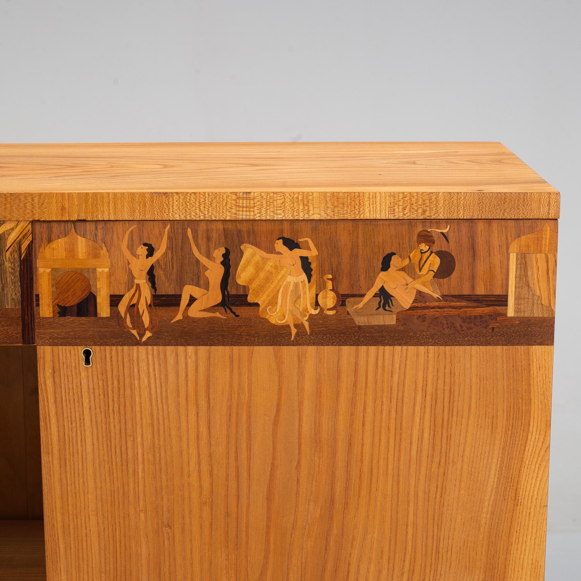 An inlaid bookcase from Mjölby Intarsia, 1930's.