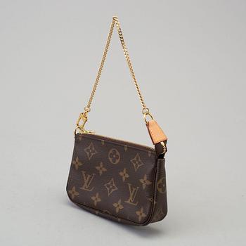 a LOUIS VUITTON small bag/pouch.