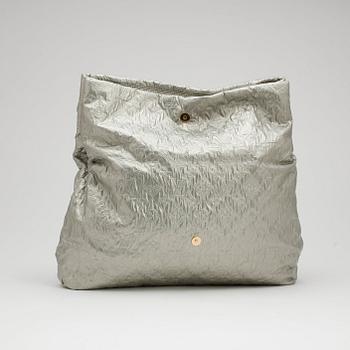 LOUIS VUITTON, a monogram silver colored clutch.