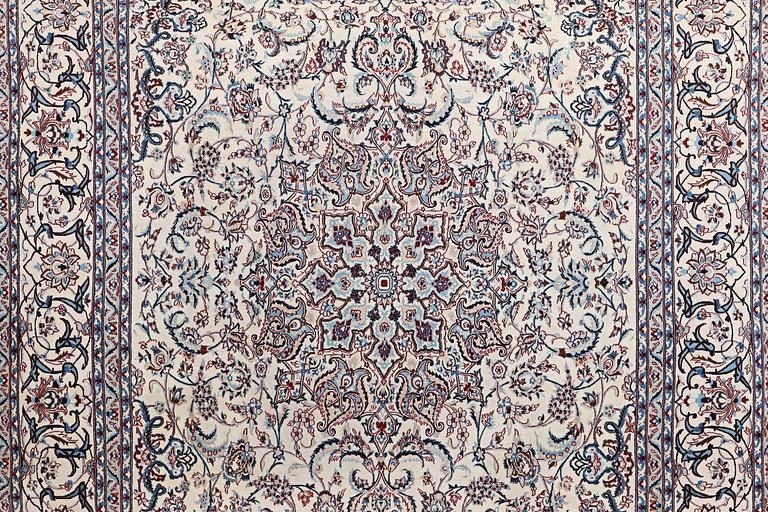A carpet, Nain, part silk, ca 426 x 309 cm.