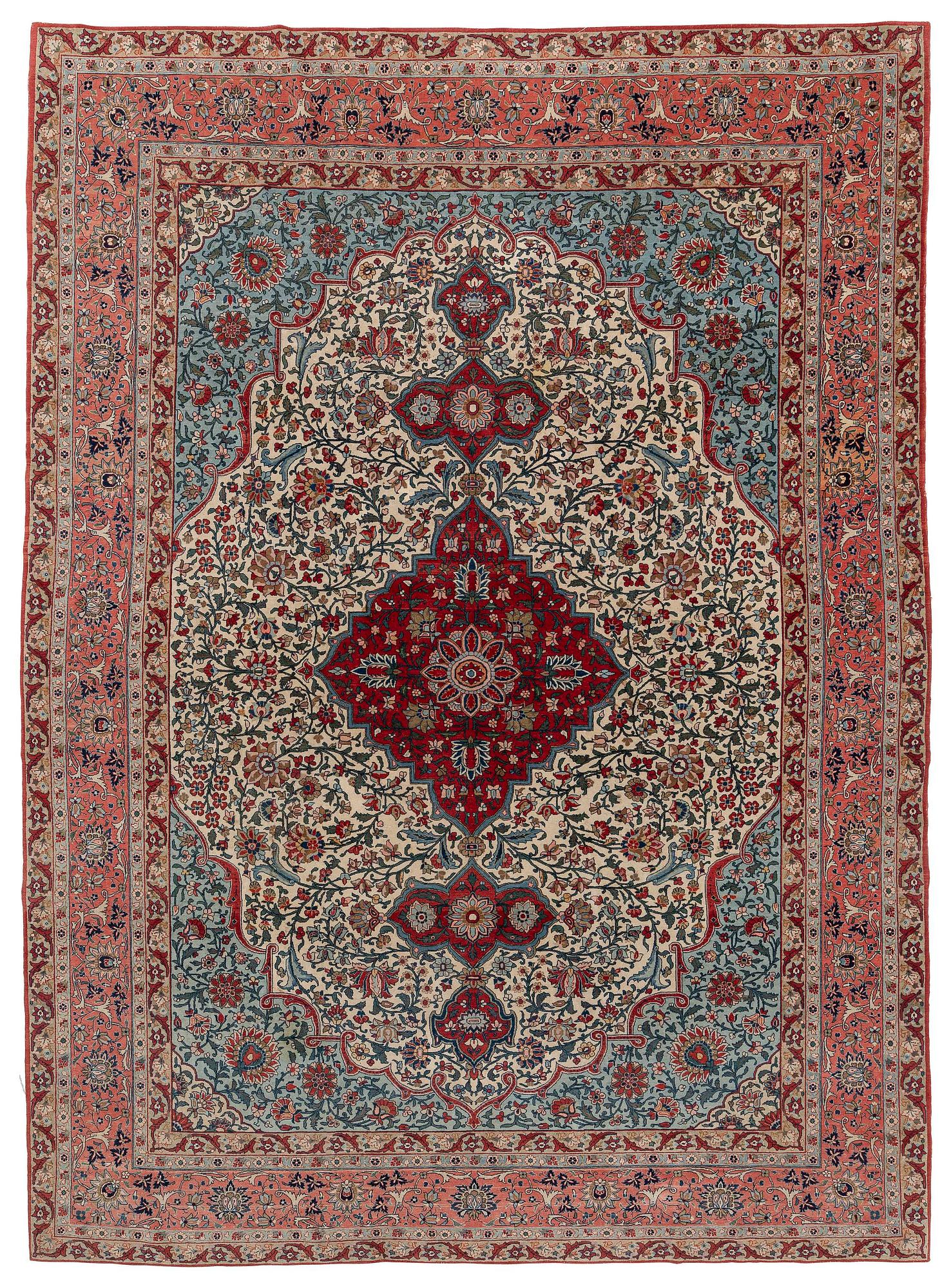 A semi-antique Qum carpet. Central Persia, c. 345 x 258 cm.