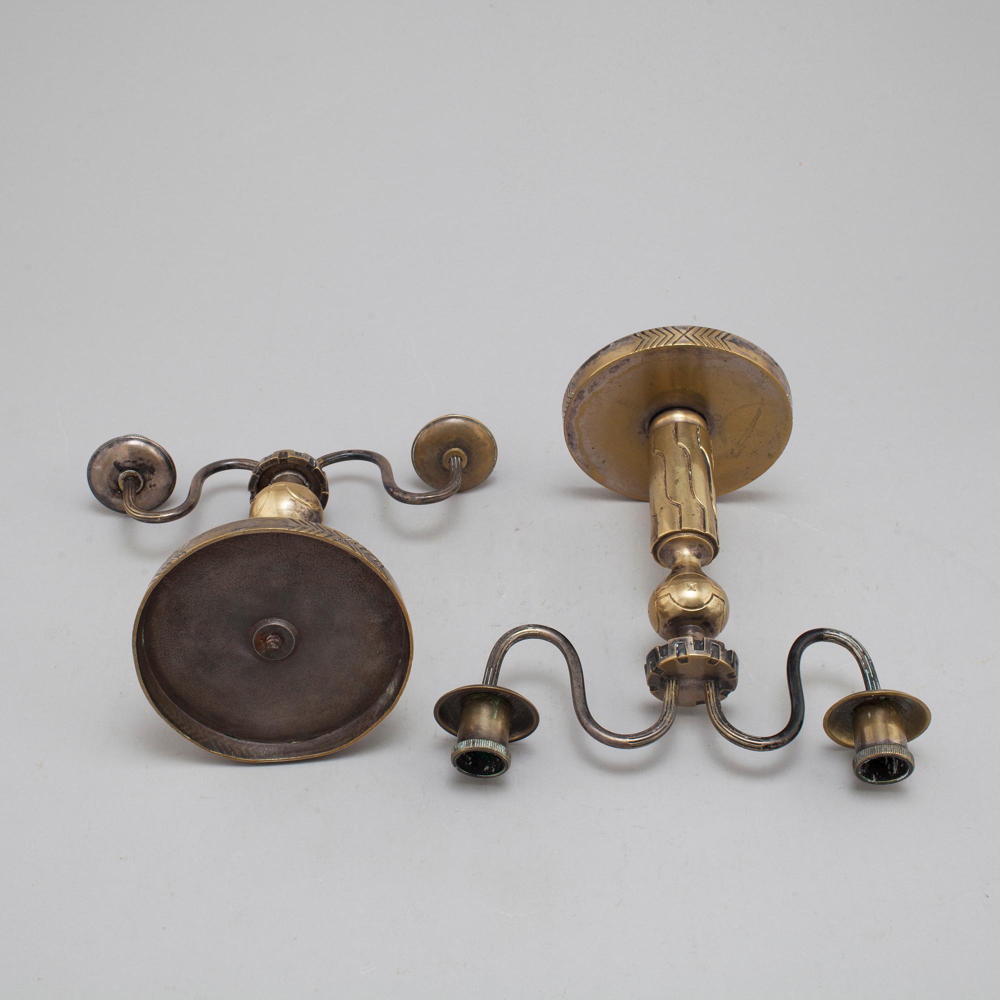 A pair of bronze candelabra, marked H. Bergman, 1920's/30's.