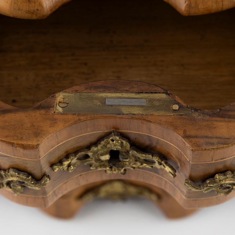 A late Baroque walnut-veneered miniature commode, 20th century.