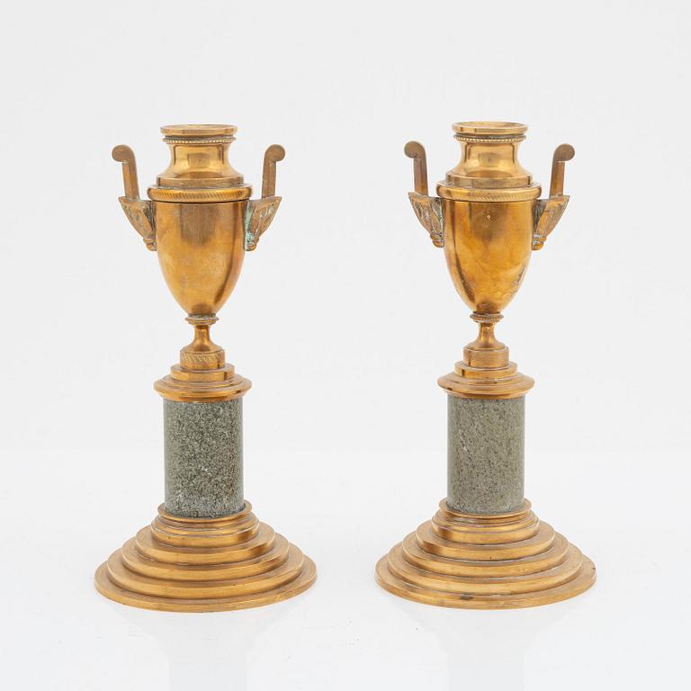 A pair of brass cassolettes from Skultuna Bruk.