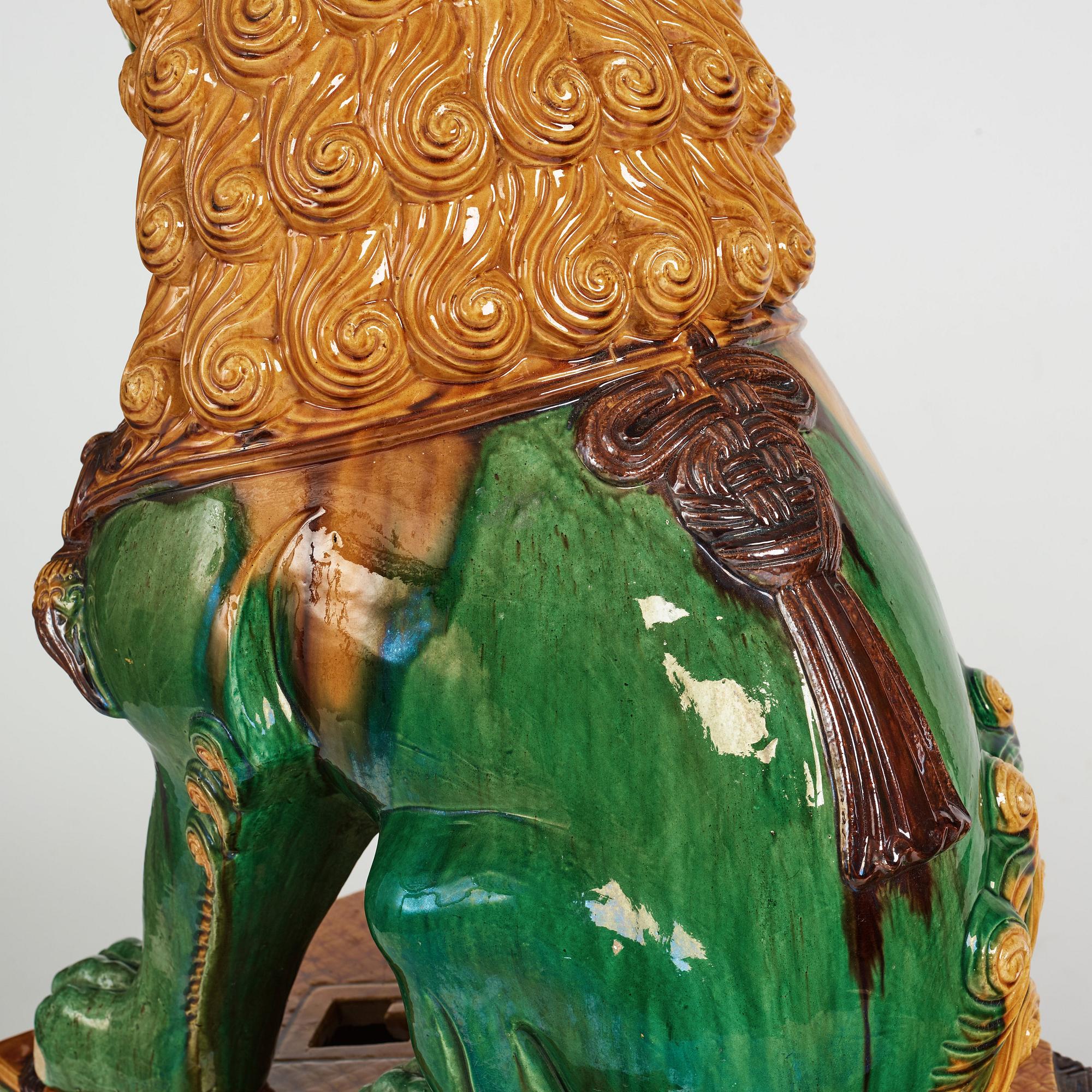 A pair of large buddhist lions, early 20th Century.