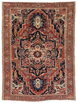 374. An antique Heriz carpet, Northwest Persia (Iran), c. 397 x 300 cm.
