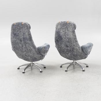 Alf Svensson, a pair of "Contourett Roto" easy chairs for Dux, Sweden.