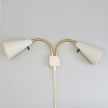 a Luco 1950's wall light.