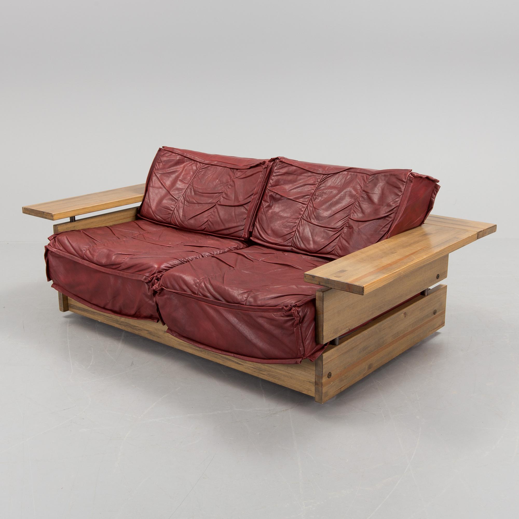 A Hämeen Kalustaja Finnish stained pine sofa, 1970's.