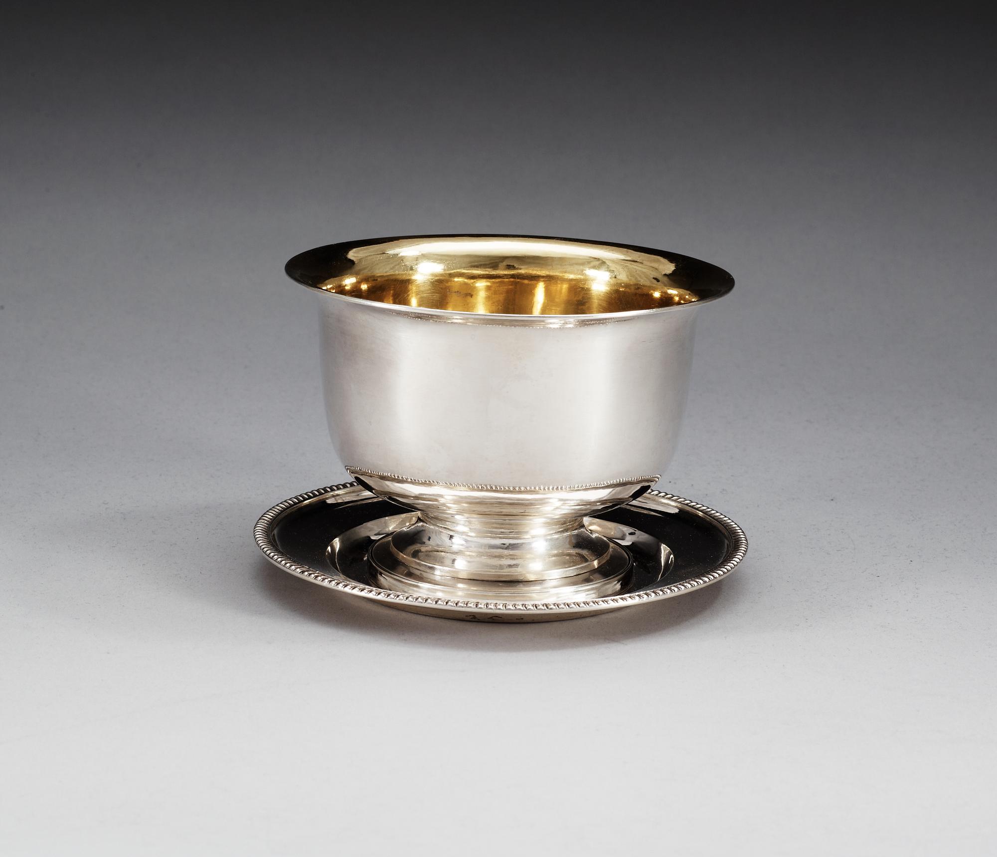 A Swedish 19th century parcel-gilt sauce-bowl, makers mark of Johan Fredrik Björnstedt, Stockholm 1825 and 1826.