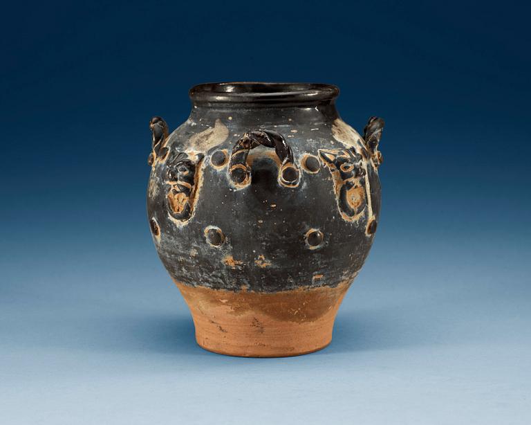 A black glazed jar, Tang dynasty (618-907).