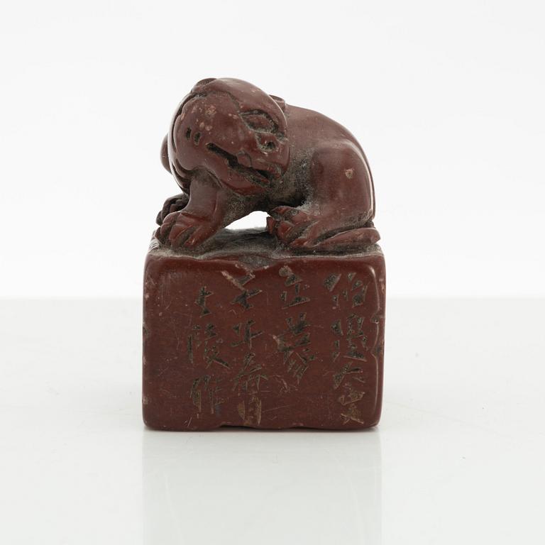 Two Chinese seals, in red and yellow stone.